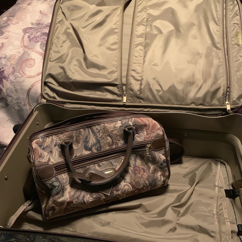 Large suitcase with matching carrying case